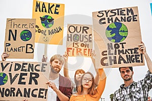 Group of demonstrators on road, young people from different culture and race fight for climate change - Global warming and