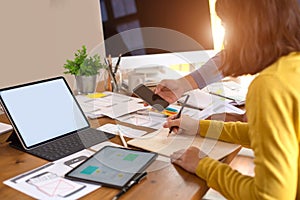 Group of Designer , or Programmer drawing website UX layout app development