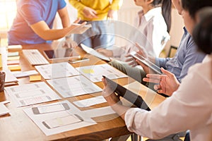 Group of Designer , or Programmer drawing website UX layout app development