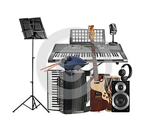 Group of different musical instruments on white