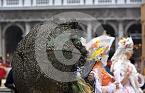 A group disguised as a Carnival party at Piazza San Marco in Venice