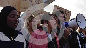 Group of diverse activist people marching for world peace.