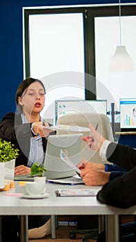 Group of diverse business people having a meeting in conference room