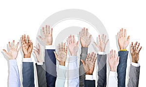 Group of Diverse Business People's Hands Raised