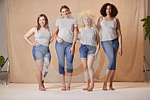 Group Of Diverse Casually Dressed Women Friends One With Prosthetic Limb Promoting Body Positivity
