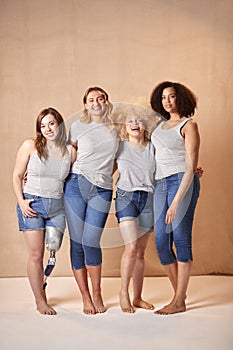 Group Of Diverse Casually Dressed Women Friends One With Prosthetic Limb Promoting Body Positivity