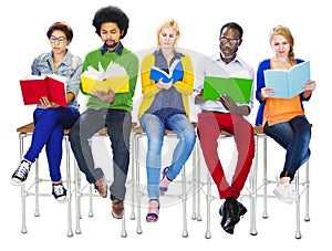Group of Diverse Colorful People Reading Books