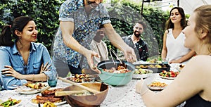 Group of diverse friends enjoying summer party together