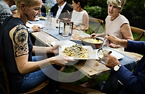 Group of diverse friends are having a dinner together