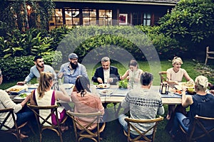 Group of diverse friends are having a dinner together