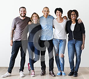 Group of diverse friends hugging