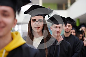 Group of diverse international graduating students celebrating