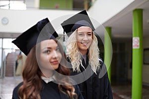 Group of diverse international graduating students celebrating