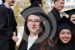 Group of diverse international graduating students celebrating