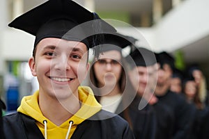 Group of diverse international graduating students celebrating