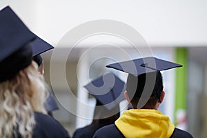 Group of diverse international graduating students celebrating