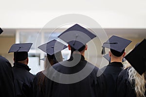 Group of diverse international graduating students celebrating