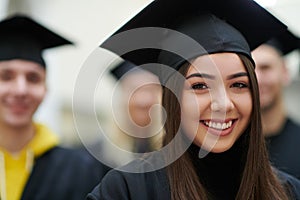 Group of diverse international graduating students celebrating