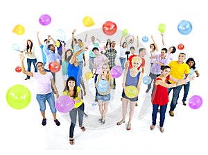 Group of Diverse People Celebrating With Balloons