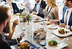 Group of diverse people are having lunch together