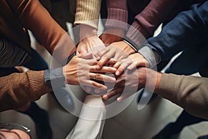 Group of diverse people joining hands together. Teamwork concept. Top view, Group of diverse hands holding each other support