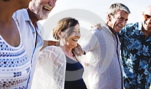 Group of diverse seniors on the beach