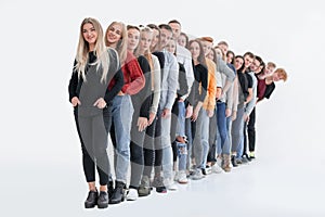 Group of diverse young people standing in line.