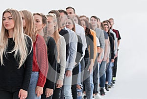 Group of diverse young people standing in line.