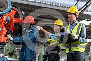 group of diversity Factory asian worker with Industrial Engineers inspector african american manager woman checking repair