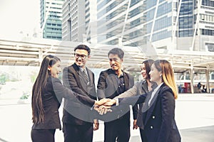 Group of diversity people fist bump holding hands together power of tag team. Teamwork Multiethnic people group working