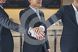 Group of diversity people fist bump holding hands together power of tag team. Teamwork Multiethnic people group working
