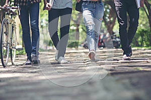 Group of Diversity Student working and walking together in park at university, Happy multiethnic friend study in asian college.