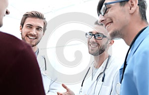 Group of doctors advising the patient