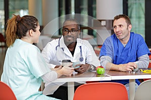 group doctors in cafeteria or canteen