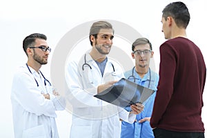 Group of doctors discussing a patient`s x-ray