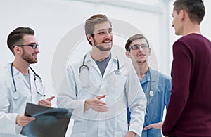 Group of doctors discussing a patient`s x-ray