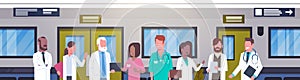 Group Of Doctors In Hospital Corridor Horizontal Banner Diverse Medical Workes In Modern Clinic