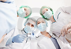 Group of doctors in operating room