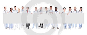 Group of doctors with placard