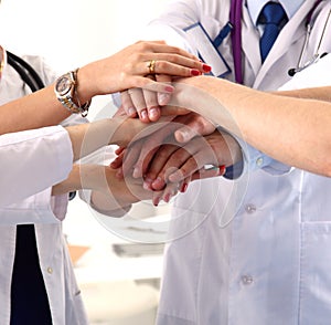 A group of doctors shaking hands