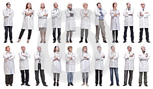 group of doctors standing in full length isolated on white