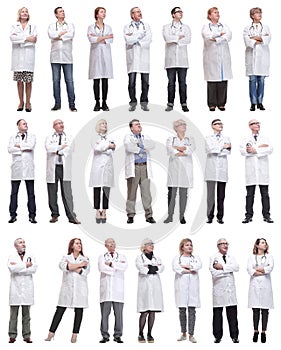 group of doctors standing in full length isolated on white