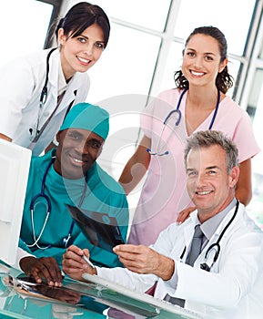 Group of doctors talking in an office