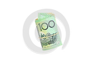 Group of 100 dollar Australian notes roll on white background