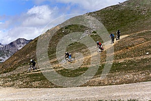 A group of downhill mountain bikers in the French Alps