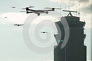 group of drones approaching the airport control tower