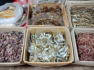 Group of dry fish in box for sale in Thailand