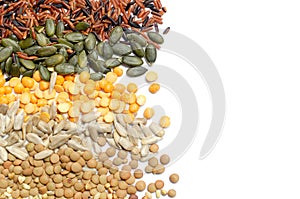 Group of dry organic colorful cereal and grain seeds consisted of rice, pumpkin seed, soybean, and lentils