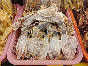 Group of Dry squid in basket for sale, Thai food