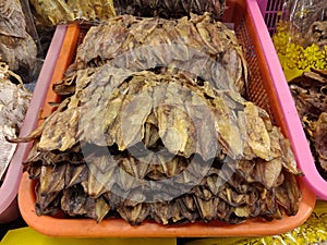 Group of Dry squid in basket for sale, Thai food